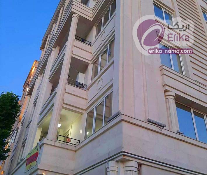 نمای بیرونی ساختمان چندطبقه سنگ تراورتن